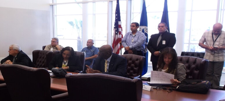 Photo of people in conference room