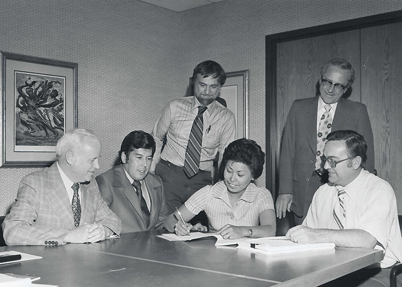 Black and white photo of Ahtna group signing of Land Claims