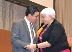 DOI Deputy Secretary Michael Conner (left) shakes hands with Ahtna Inter-Tribal Resource Conservation Executive Director Karen Linnell.