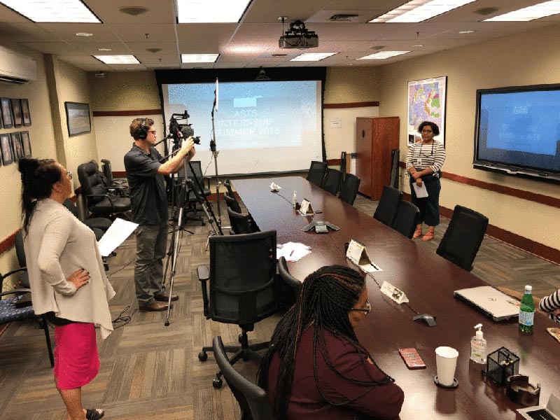 Tracy Parent, Shareholder Development Coordinator attends the videoing of Jasznia Marshall’s presentation and videoed by Communication Intern Rodney Lengele.