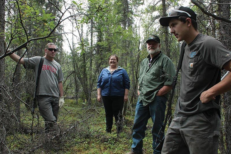 Photo of Ahtna team in the forest