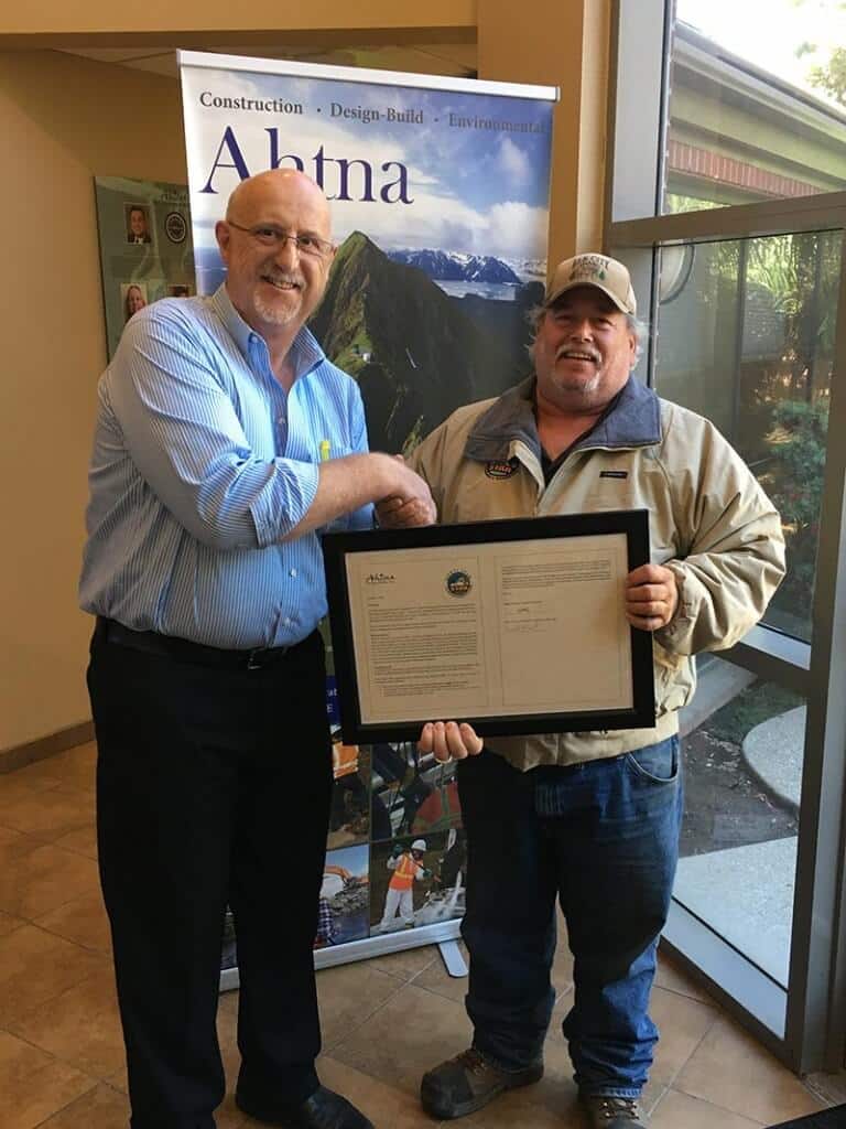 Gregory Wells (right), AGSC/ADB construction superintendent, receives STAR Level 1 Award from David Frenzel, director of construction (AGSC / ADB).