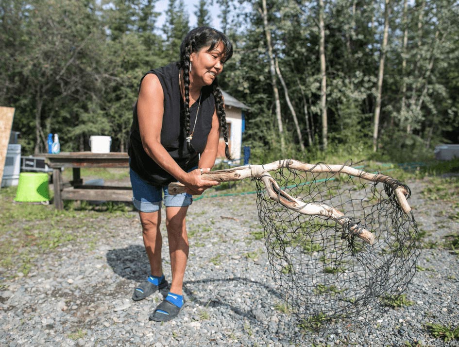 Tursy Ann Smelcer at her fishcamp on the Copper River.