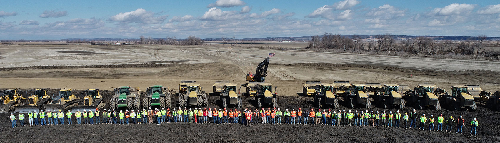 Ahtna workers and equipment lined up.