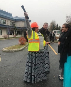 Tina Chapman leads a training session in the Anchorage corporate building parking lot.